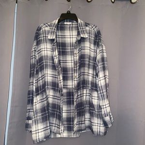 Button up flannel with a little flare at the bottom